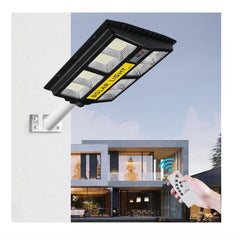 Lampa solara stradala Practicpentrucasa, cu telecomanda, senzor de miscare si lumina, suport prindere, 720 LED-uri, IP65, ABS, 15AH, 500W, temperatura culoare 6500K, 44.5x34.7x6.6 cm, autonomie 10-12 ore, negru