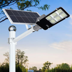 Lampa solara stradala Practicpentrucasa, IP65, senzor de lumina, 417 LED-uri SMD, 24000 lm, 300W, autonomie 12-16 ore, telecomanda, montare prin fixare, pentru strada sau gradina, finisaj lucios, material ABS, 49.5 x 21 x 6.5 cm, lumina alb rece