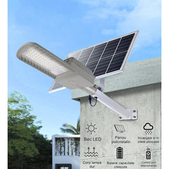 Lampa solara stradala Practicpentrucasa, IP65, senzor de lumina, 60 LED-uri SMD, 2250 lm, panou 25W, putere 200W, autonomie 12-16 ore, telecomanda, montare prin fixare, pentru strada sau gradina, finisaj mat, material ABS,  51.5 x 21 x 7.5, gri