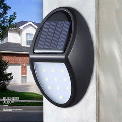 Aplica solara LED pentru perete Practicpentrucasa, in forma ovala, 10 LED-uri, lumina puternica, IP65, 12 x 7.5 cm, 1.2 V, 300 mAh, autonomie 8-10 ore, alb rece