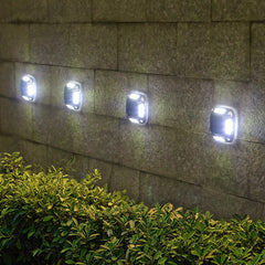 Lampa solara LED pentru gradina Practicpentrucasa, 8 LED-uri, prindere de perete sau impamantare, IP65, forma patrat, material ABS si Policarbonat, 9 x 9 cm, baterie 1.2V, 600 mah, alb rece