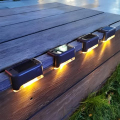 Set 4 Aplice Solare, Practicpentrucasa, Lumina LED-uri, IP65, din ABS+PC, 8-10 h Iluminare, Baterie 1.2 V 600 mAh, Montare pe Trepte/Borduri, Lumina Alb Cald, 7.9 x 5 cm, Negru